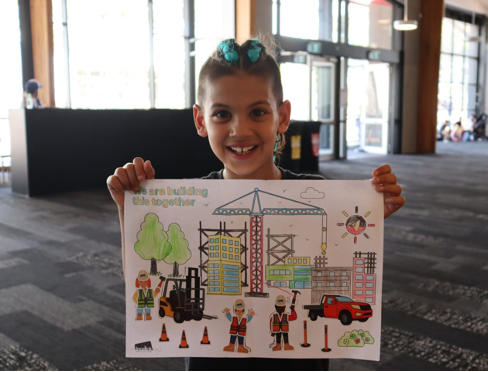 Photo of young boy colouring in